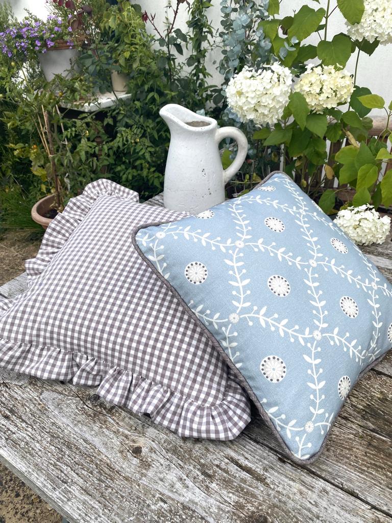 Blue and white scatter cushions top